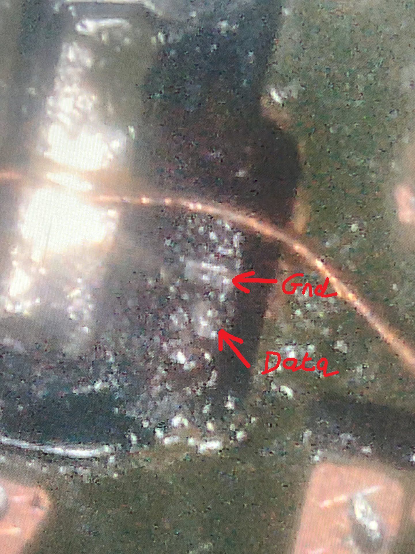 Exposed data and ground points inside a damaged PS5 Pro HDMI pad area