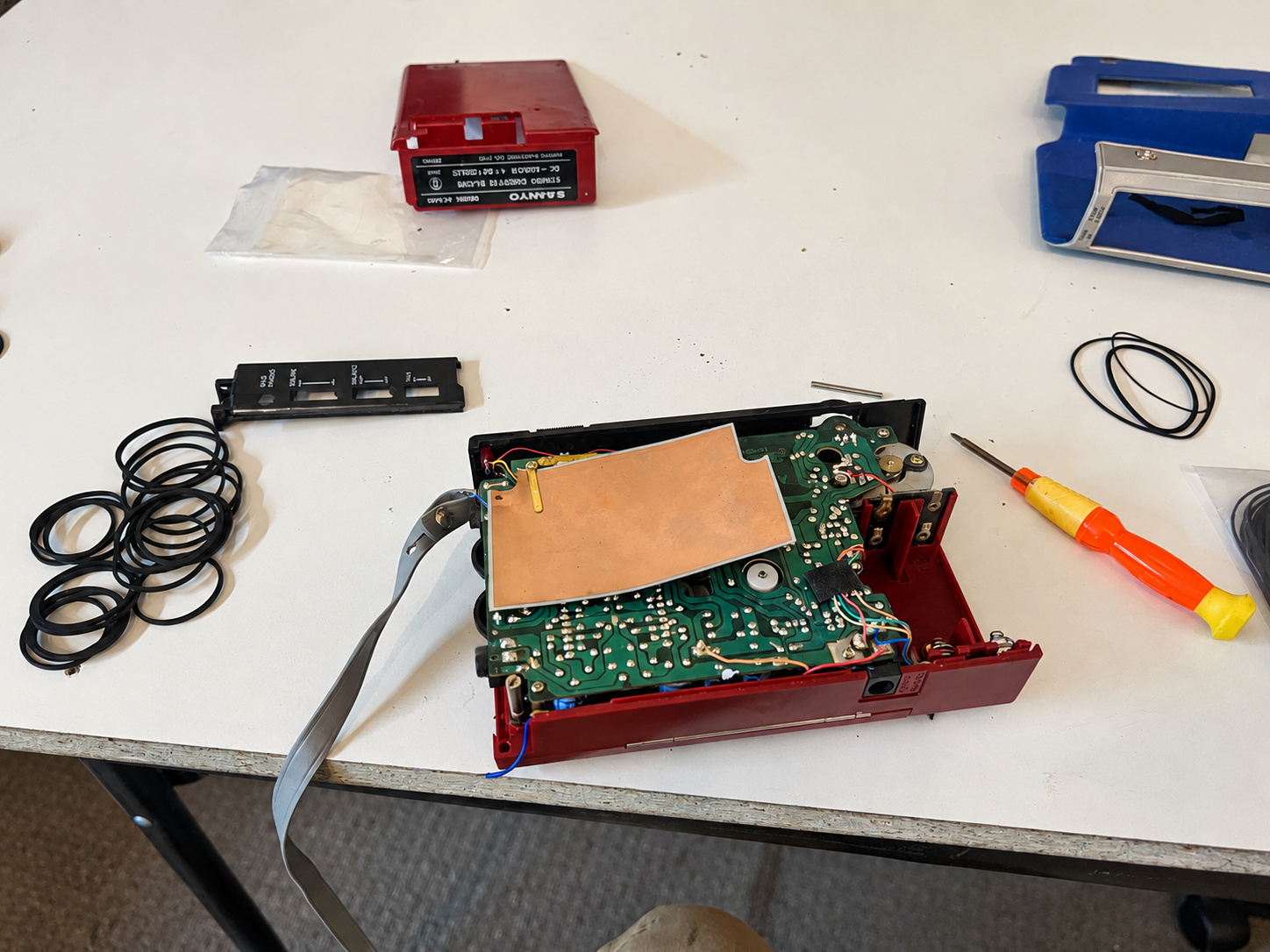 Sanyo M4440 opened on the repair bench with its circuit board exposed