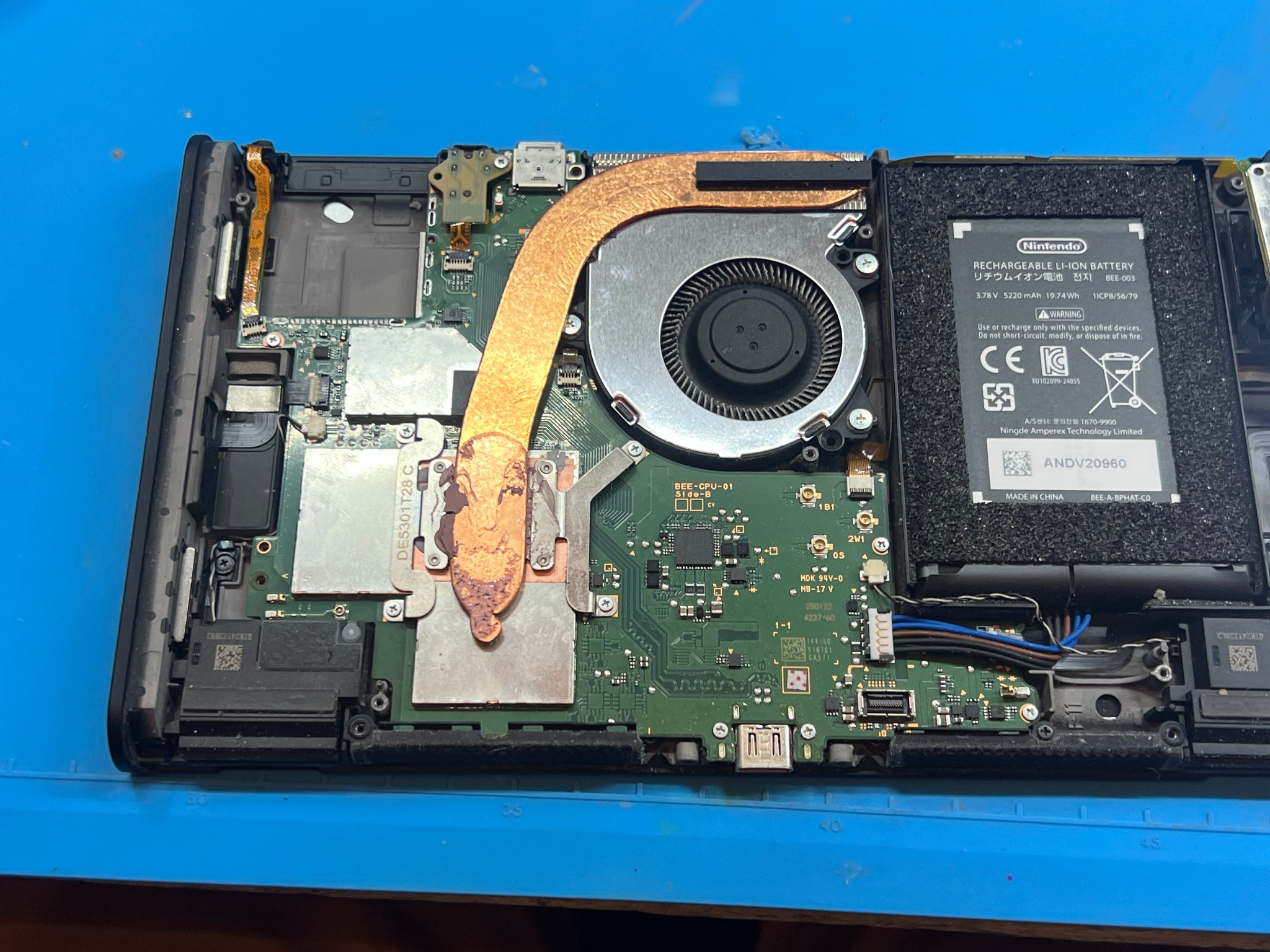 Switch 2 motherboard, cooling assembly and battery with the outer shielding removed